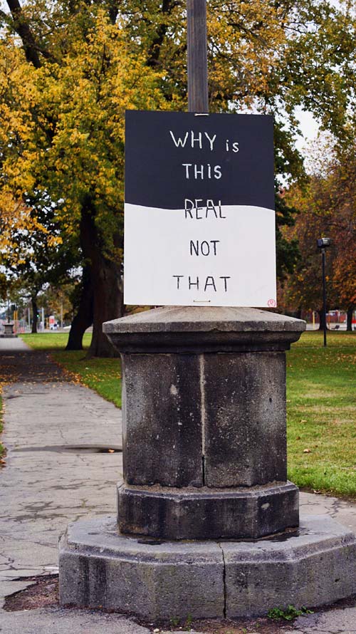 ‘Why is this real not that’&nbsp;sign