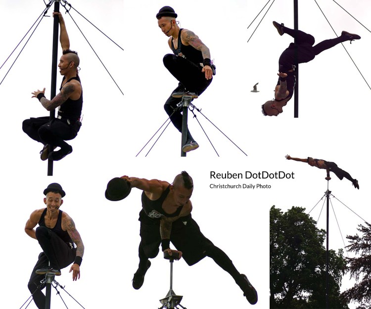 Acrobat Reuben DotDotDot performing impressive stunts on a Chinese Pole at the Busker's Festival, with a focus on his athleticism and artistry.