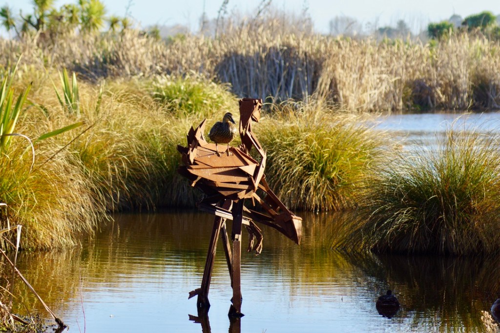 Duck on a bird sculpture, at Travis&nbsp;Wetlands